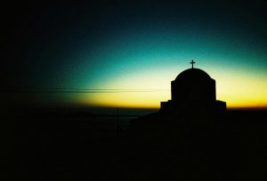 Sunset with church in Tinos, Greece