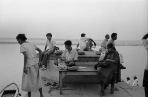 People along the Ganges river in an early morning.