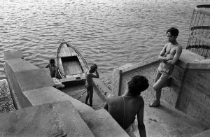 People baths, wash their bodies and wash their clothes in the Ganges river.