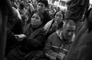 Tibetan pilgrims wait for the blessing from Shechen Ramjam Rinpoche in a monastery, Nepal.