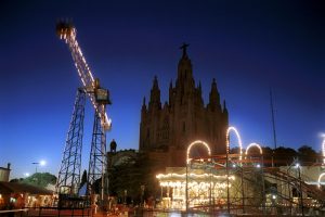Amusement park of Tibidabo at dusk in Barcelona, Spain.
