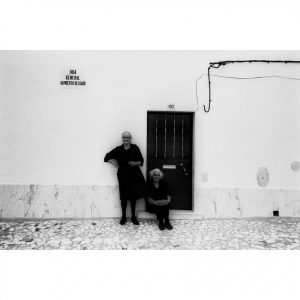 Widows in black clothes in Évora, Portugal