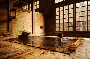 Hot spring wooden bath in ryokan